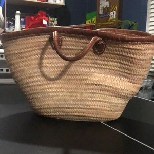 Large straw bag with leather handles